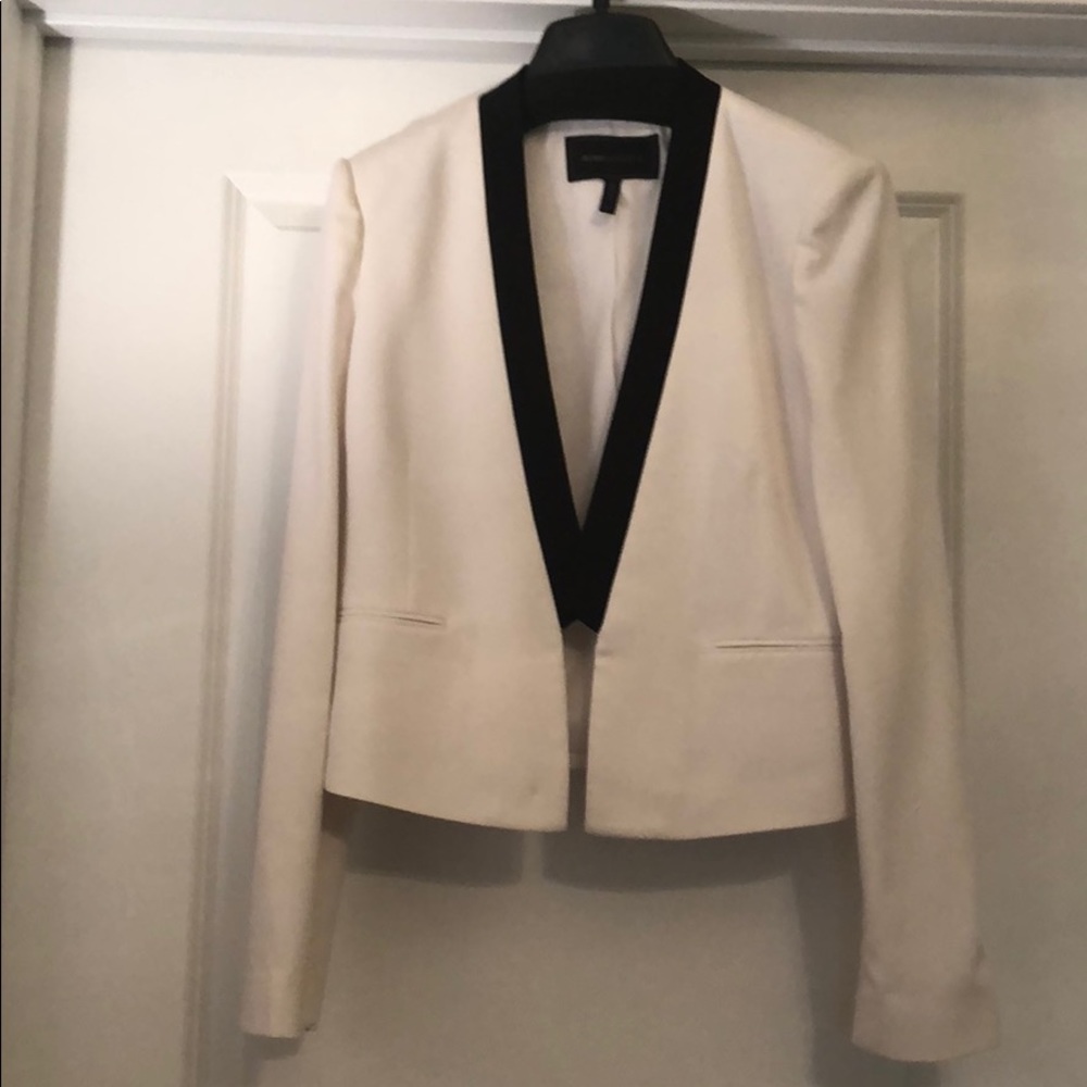 White blazer. Worn once in perfect condition .